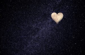 single heart on dark background
